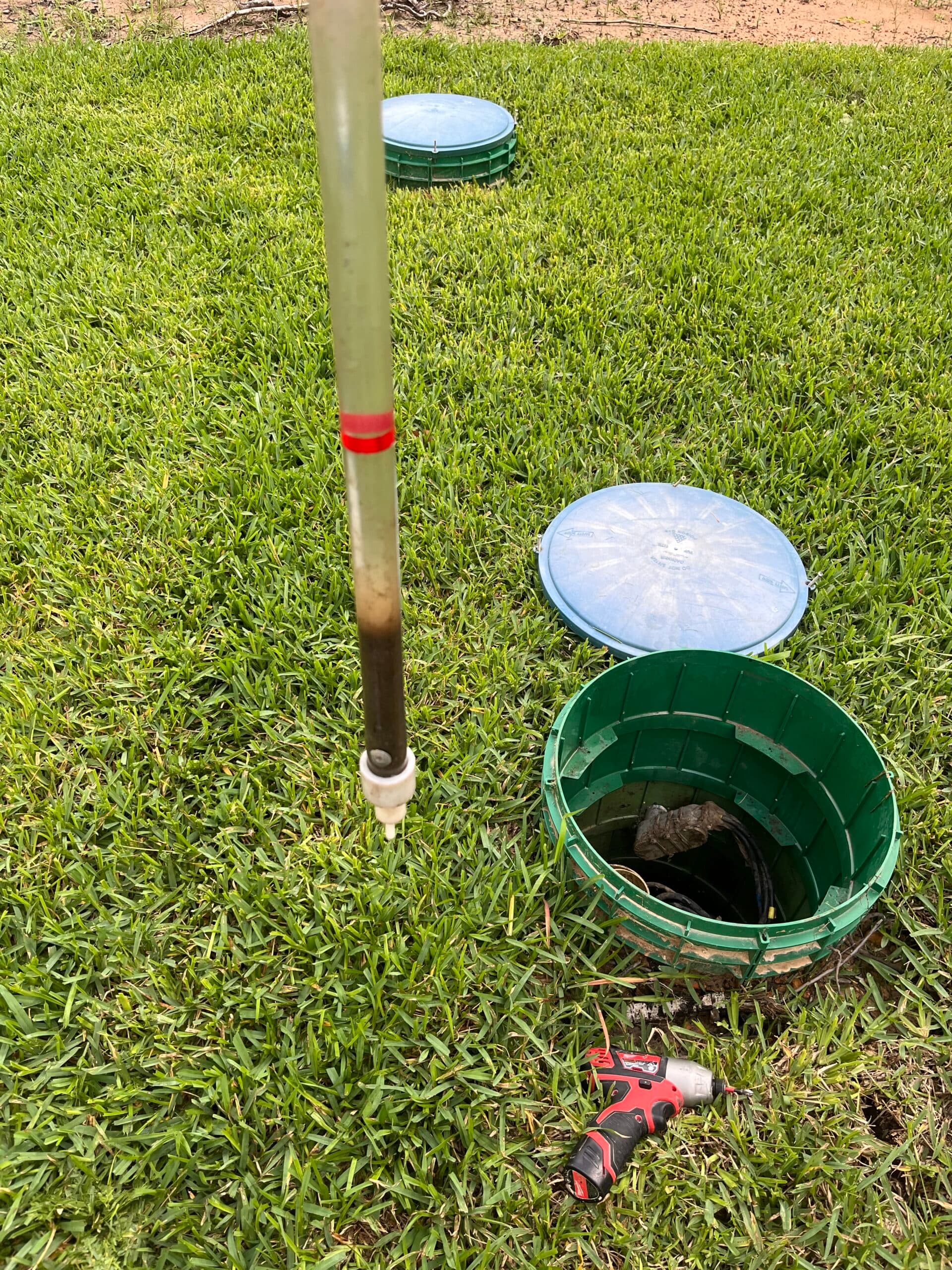 Field testing being performed on site to evaluate septic system conditions